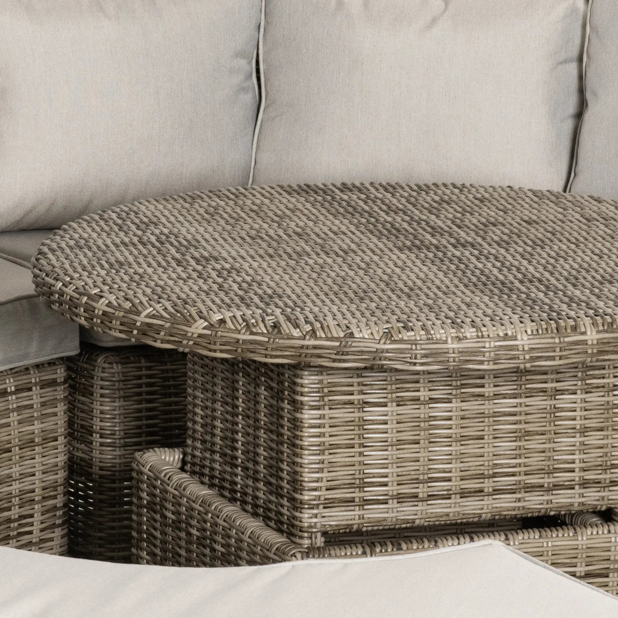 Wicker coffee table with a textured surface on a neutral background