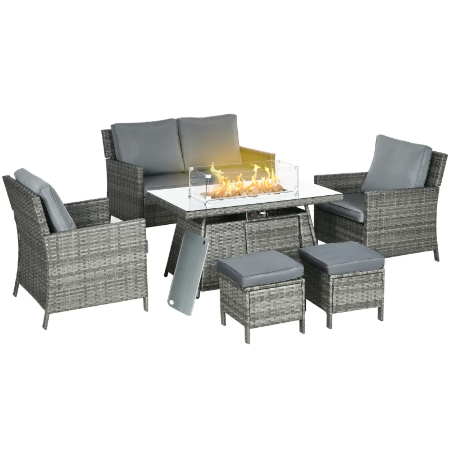 Outdoor patio set with wicker chairs, table, and fire pit on a white background