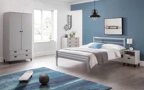 Modern bedroom with gray bed, wardrobe, and blue walls.