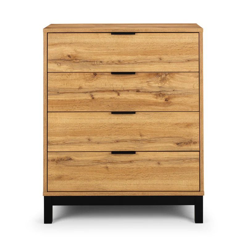 Wooden dresser with four drawers on a white background