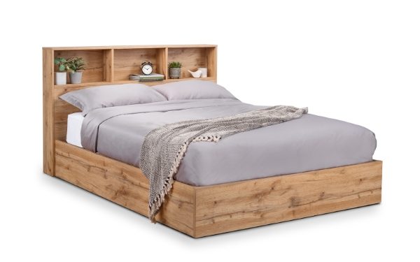 Wooden bed with bookshelves on a white background