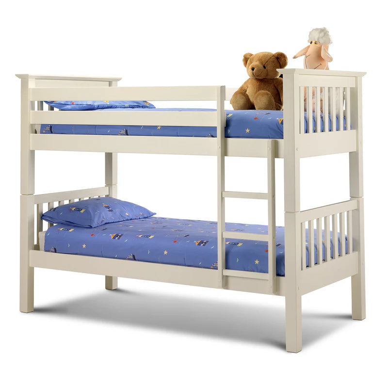 White bunk bed with blue bedding and stuffed animals on a white background