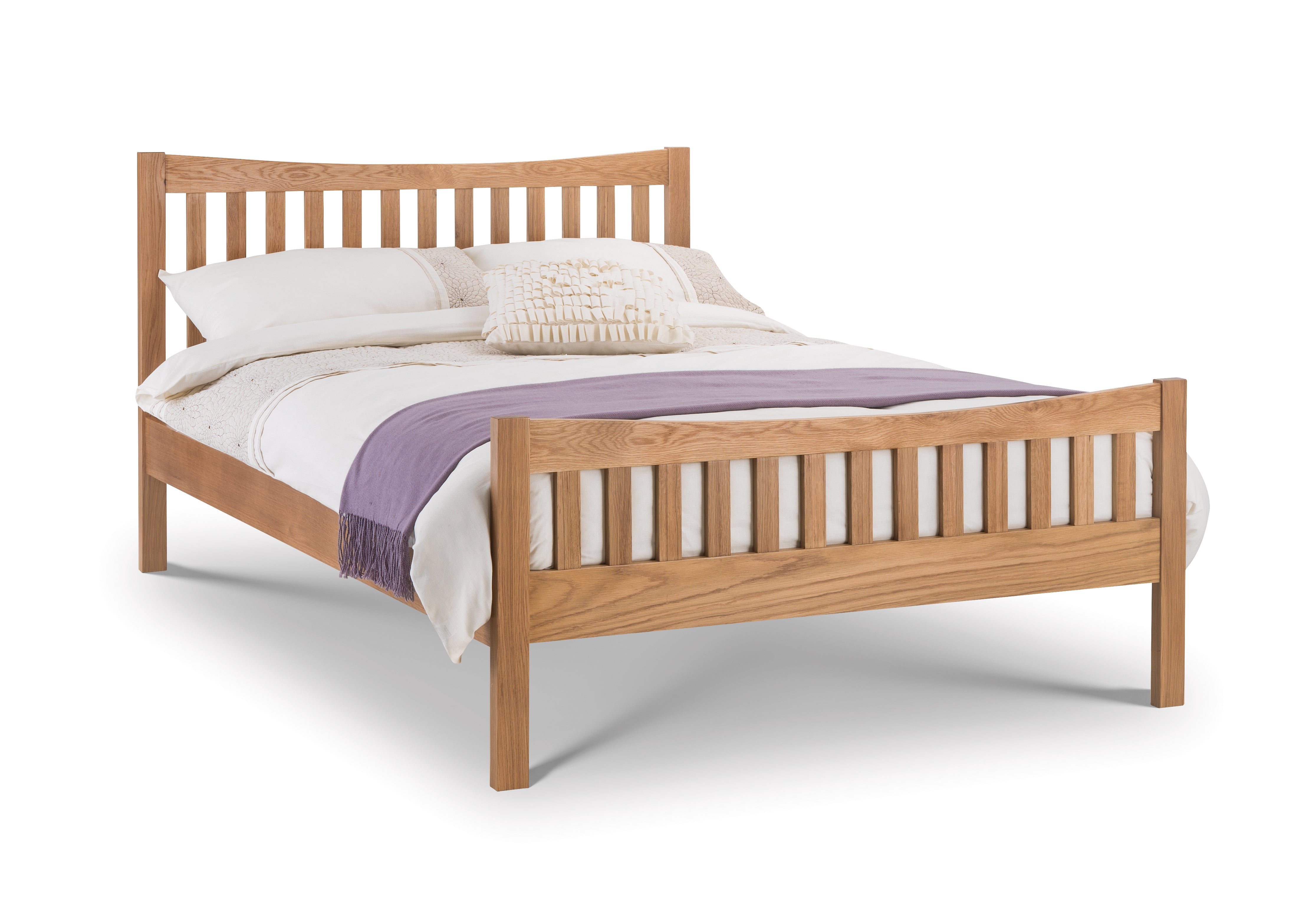 Wooden bed with white bedding and a purple blanket on a white background