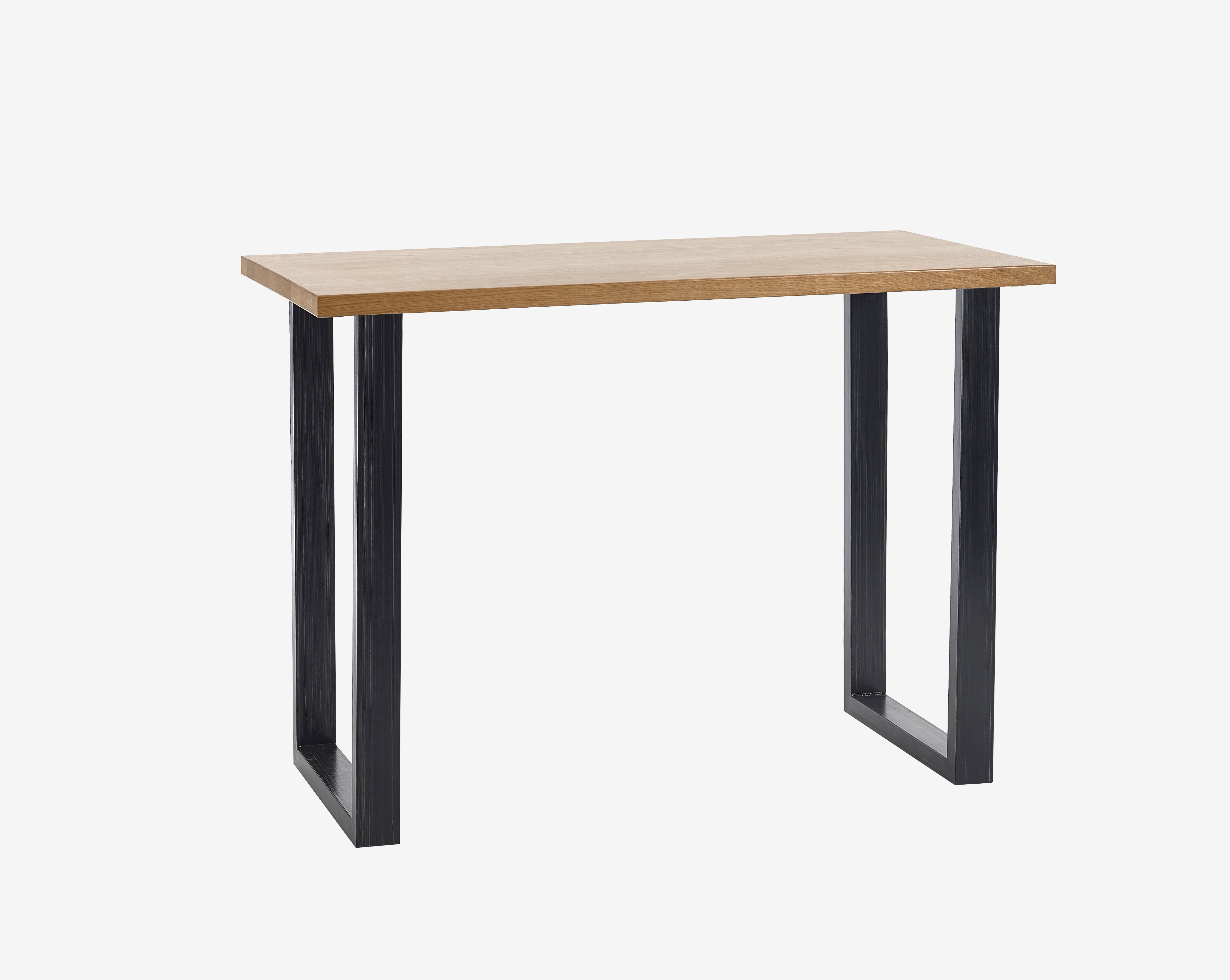Table with wooden top and black metal legs on a white background