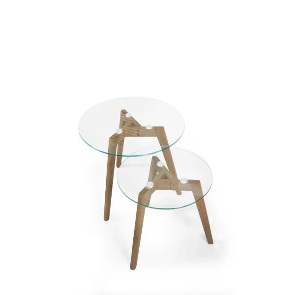 Set of two glass tables with wooden legs on a white background