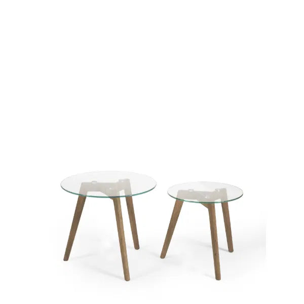 Two glass tables with wooden legs on a white background