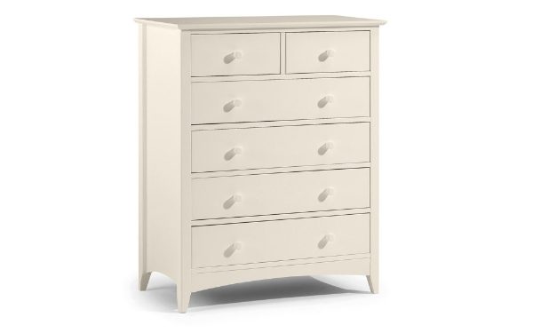White dresser with multiple drawers on a white background