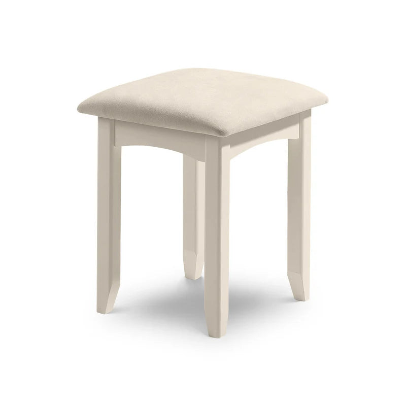 Beige stool with a cushioned seat on a white background