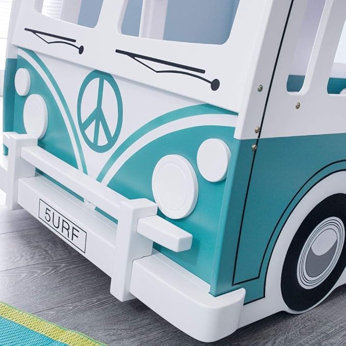 Teal and white van-shaped bed with peace symbol design on a wooden floor.