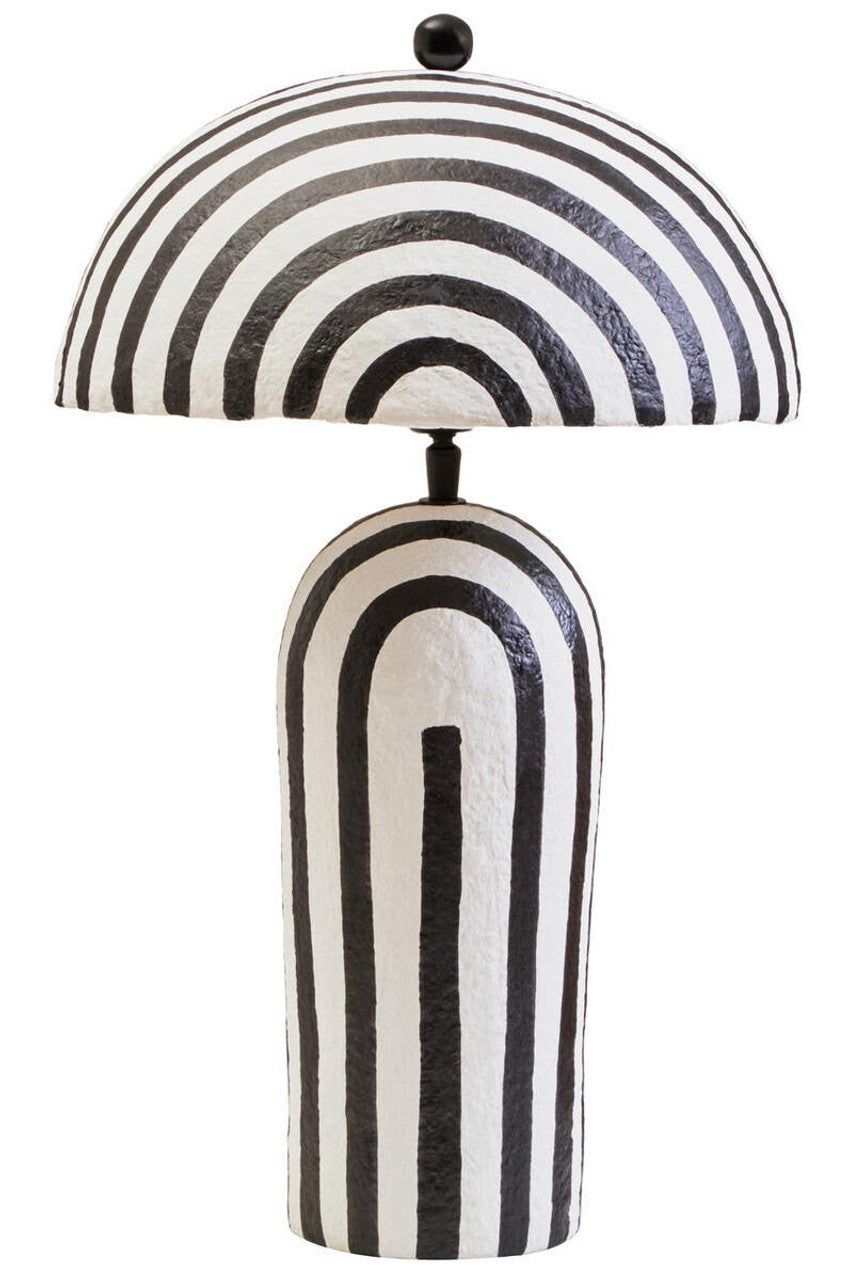 Black and white striped table lamp on a white background