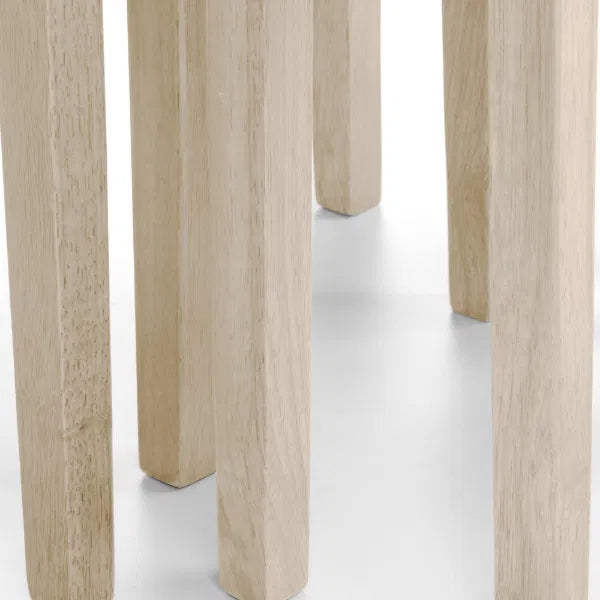 Close-up of light wooden legs on a white background