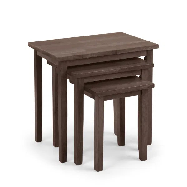 Set of three wooden nesting tables on a white background