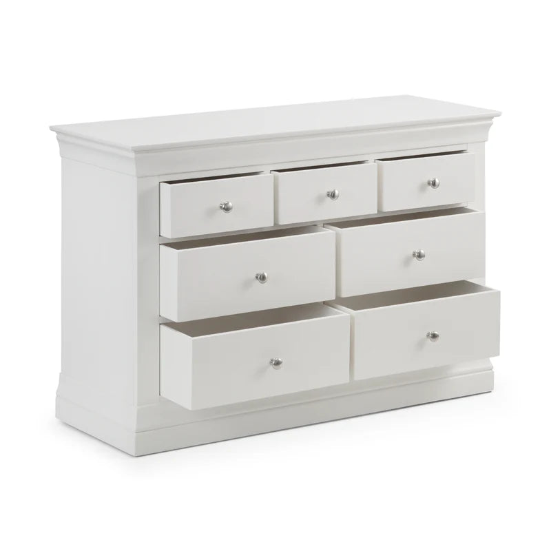 White dresser with multiple drawers on a white background
