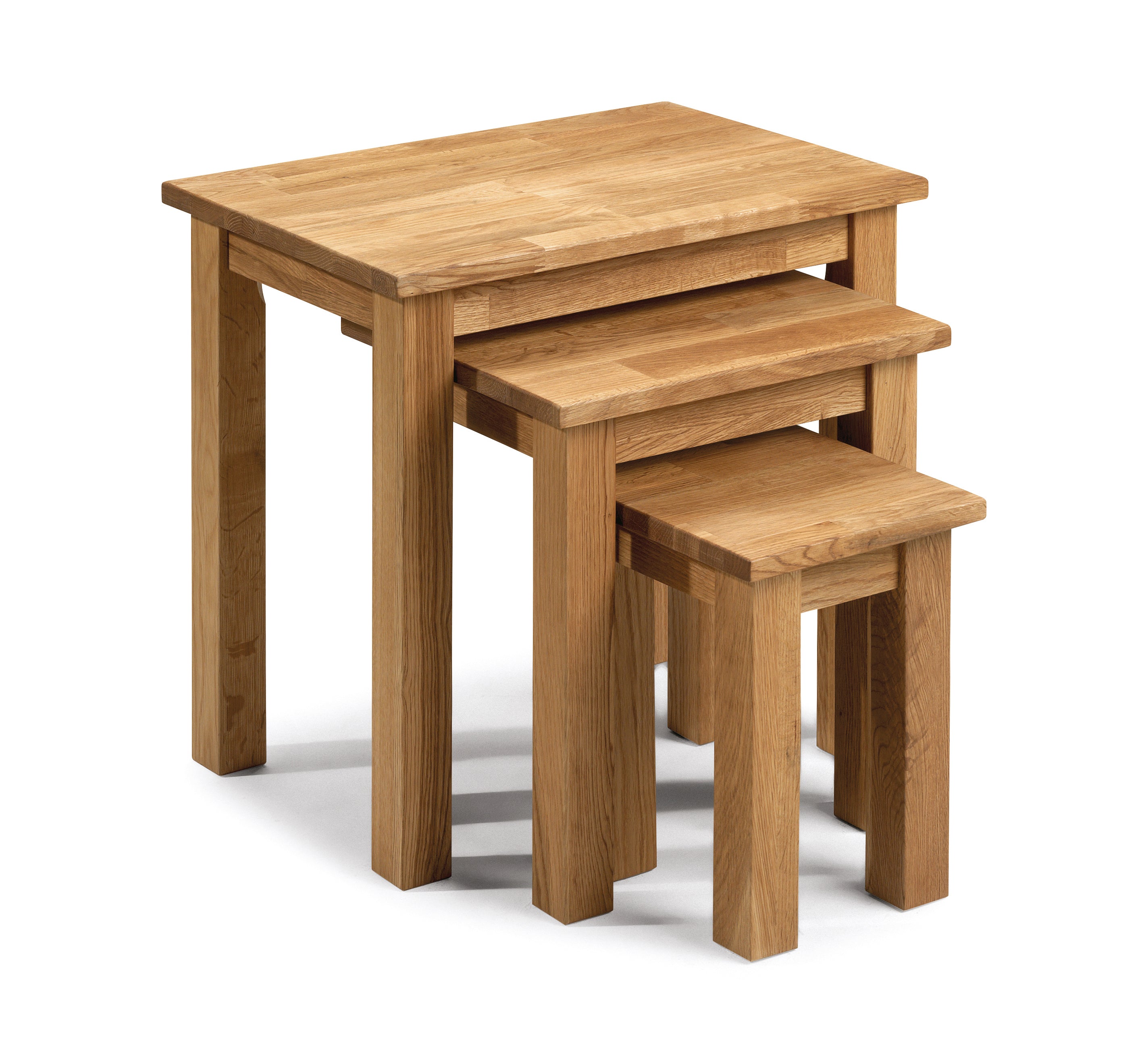 Set of three wooden nesting tables on a white background