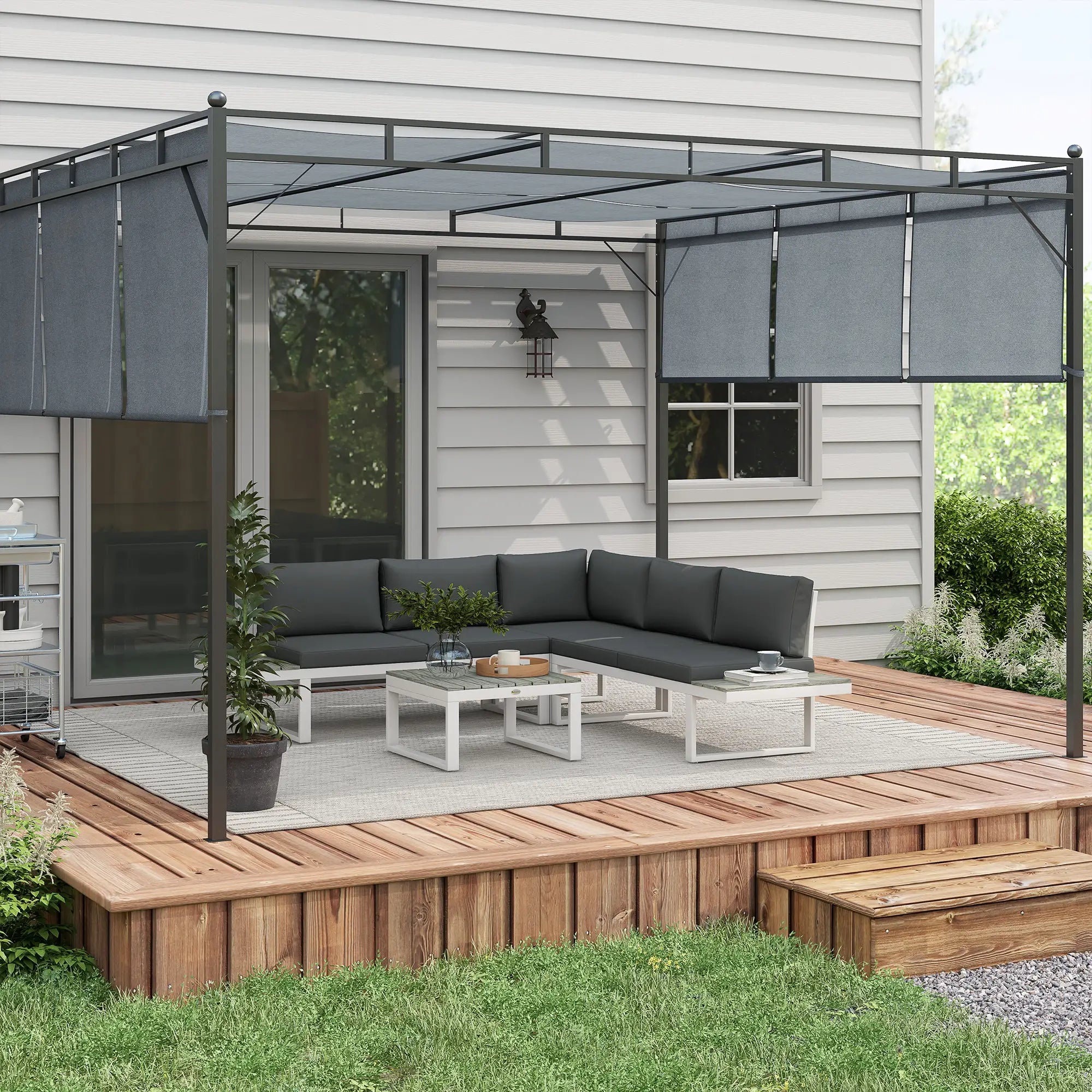 Outdoor patio with sectional sofa, coffee table, and pergola on a wooden deck.