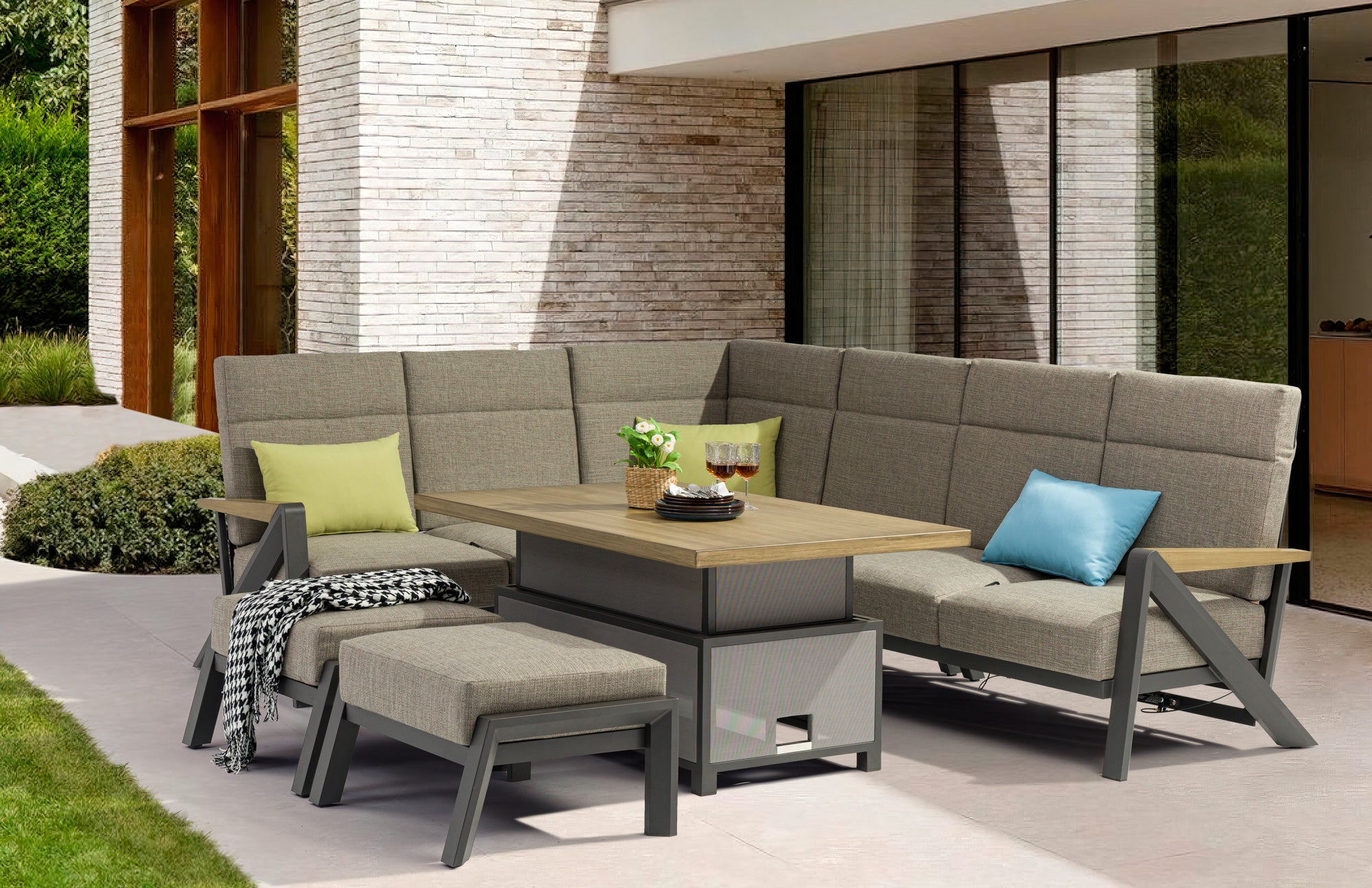 Outdoor patio furniture set with a table and cushions on a patio.