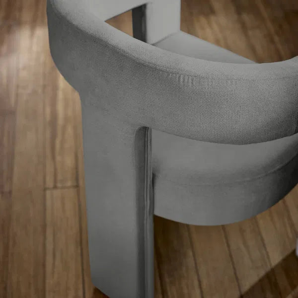 Gray stool on a wooden floor