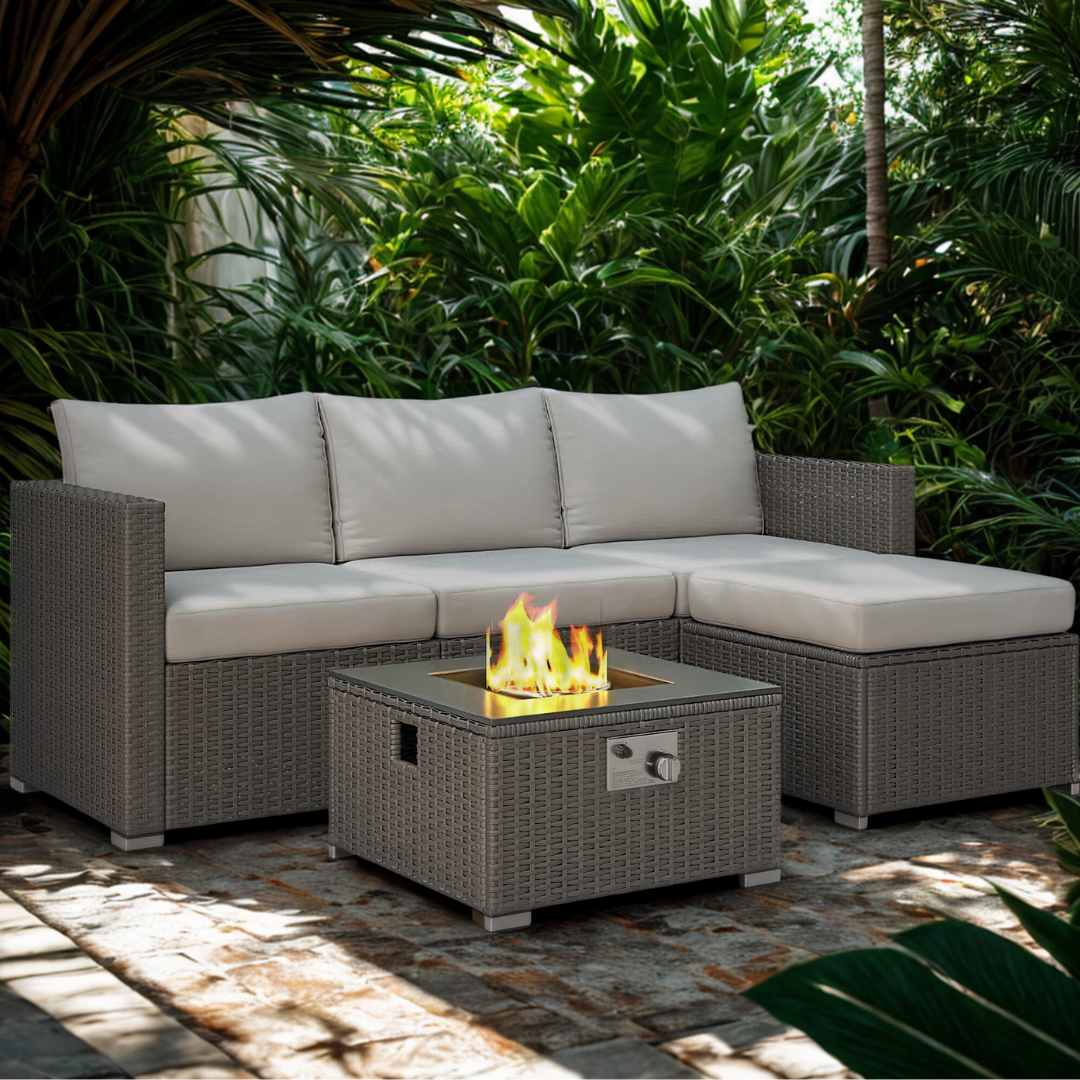 Rattan fire pit garden furniture set arranged on a patio surrounded by greenery