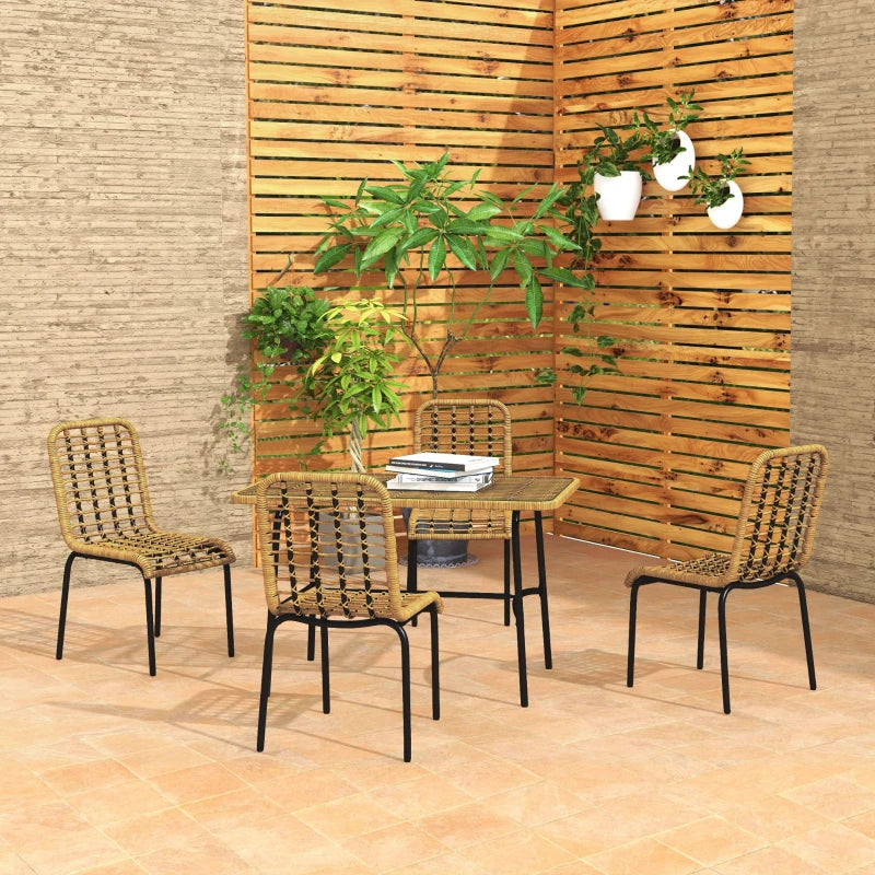 Outdoor furniture set with four chairs and a table against a wooden panel background.