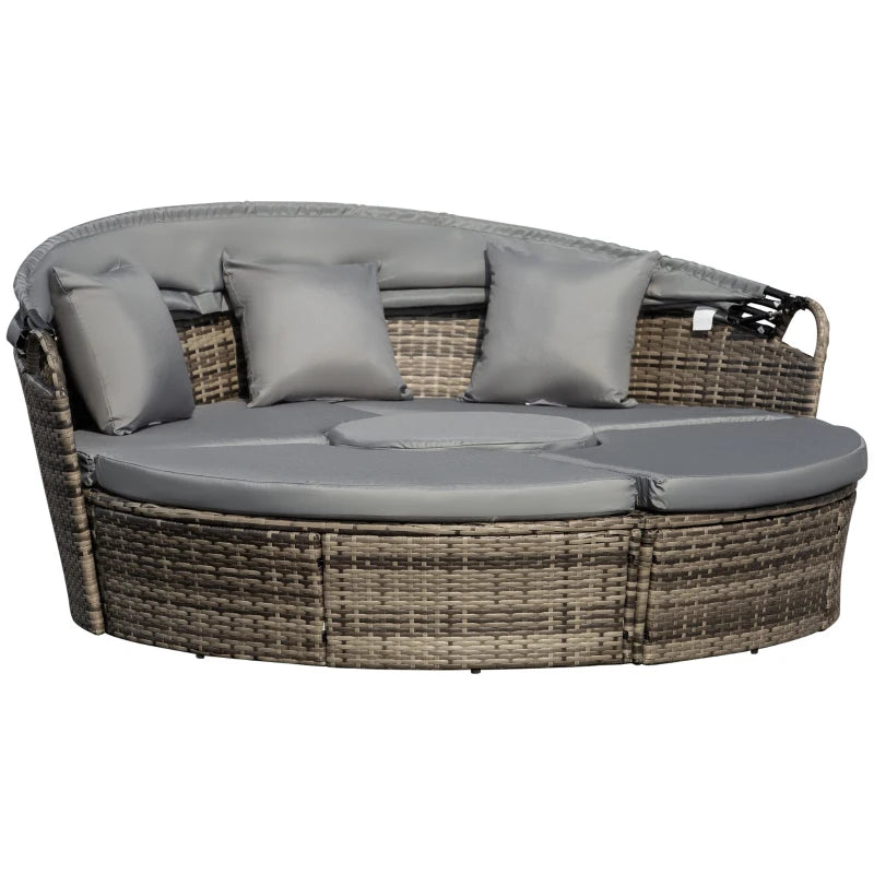 Round outdoor sofa with wicker frame and gray cushions on a white background