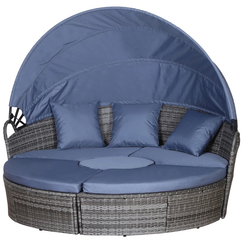 Round outdoor lounge chair with canopy and blue cushions on a white background