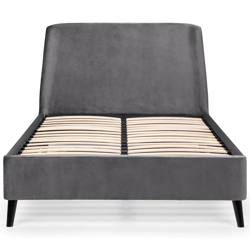 Gray upholstered bed frame with wooden slats on a white background