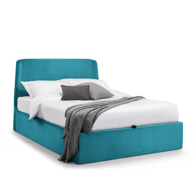 Teal bed with white bedding and gray blanket on a white background
