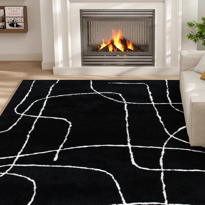 Black rug with white lines in a living room with a fireplace and sofa.