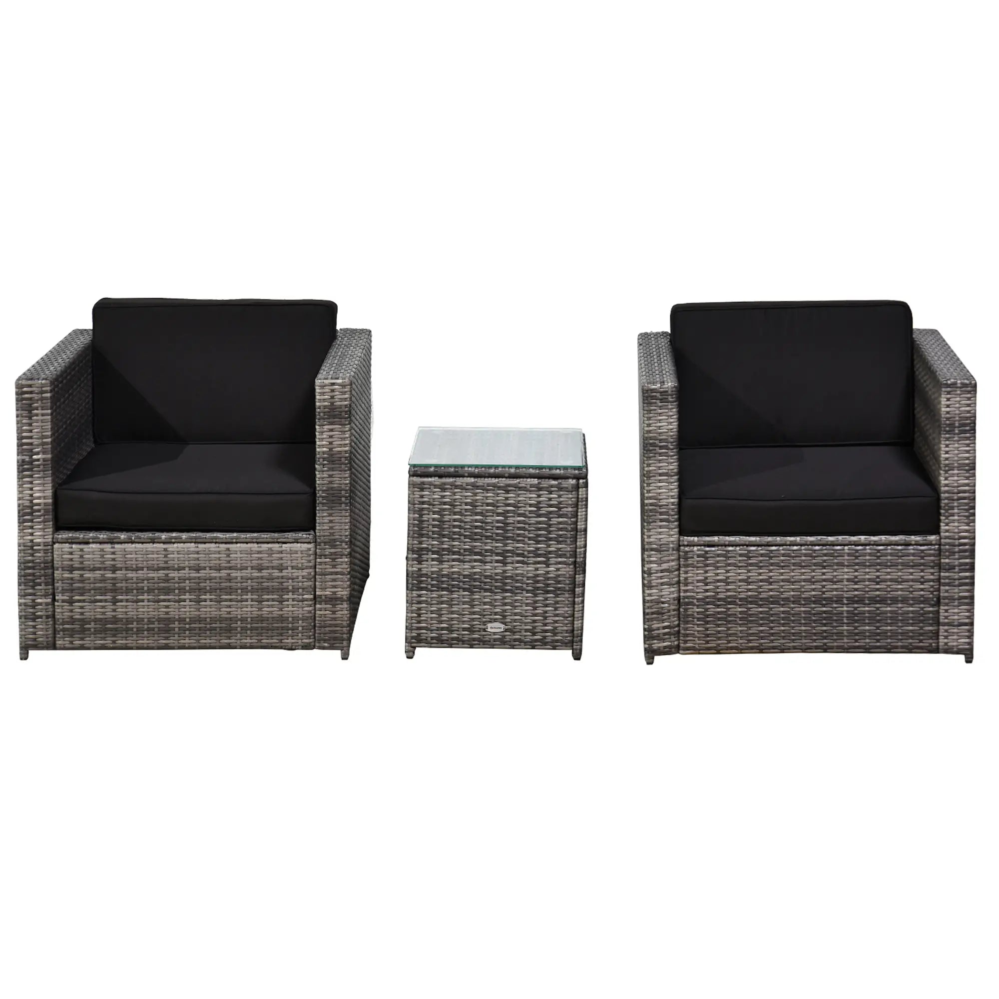 Outdoor furniture set with two wicker chairs and a small table on a white background