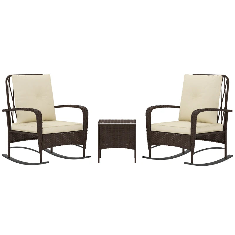 Two wicker chairs with beige cushions and a matching table on a white background