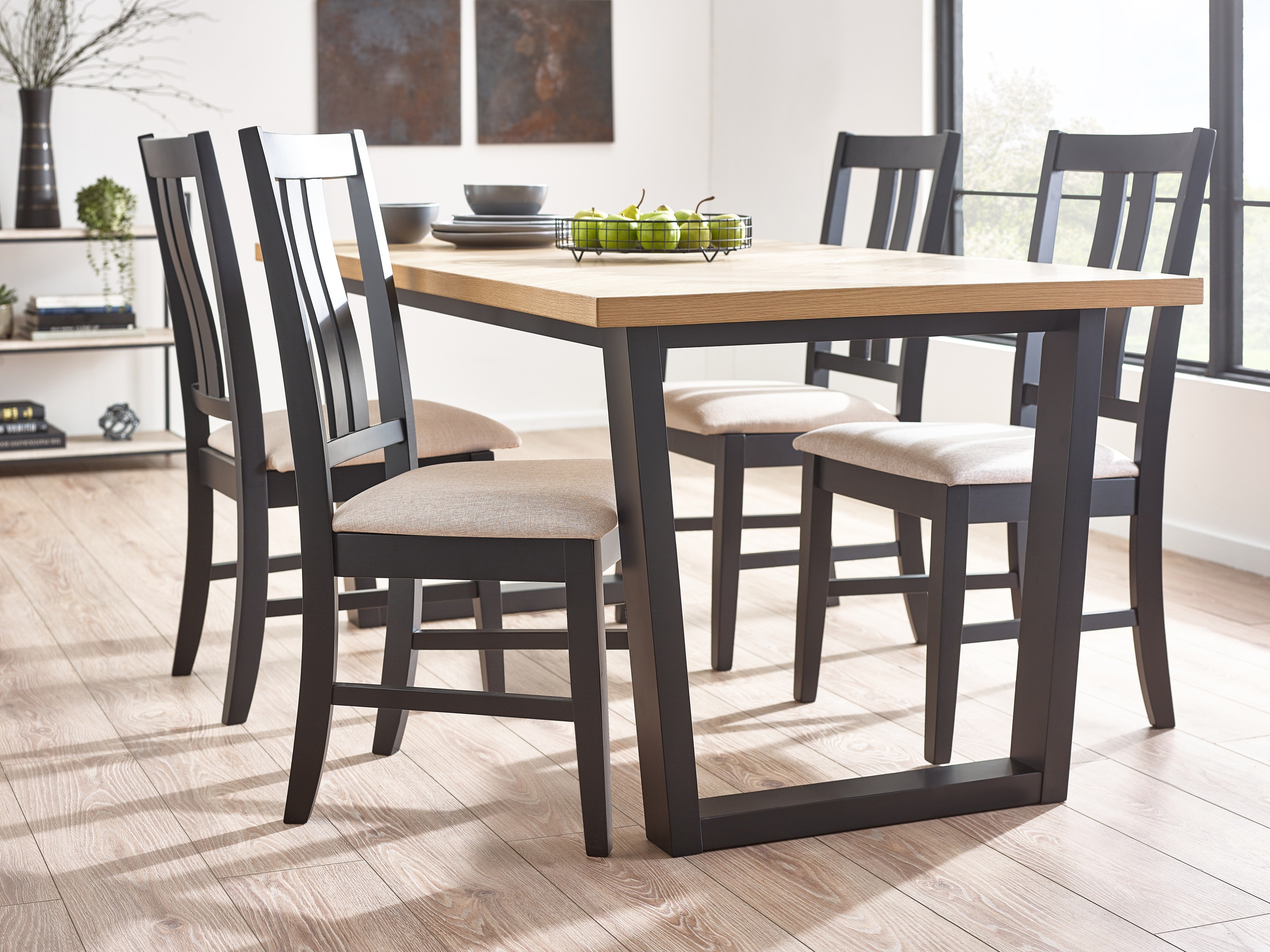 Dining table with chairs in a well-lit room