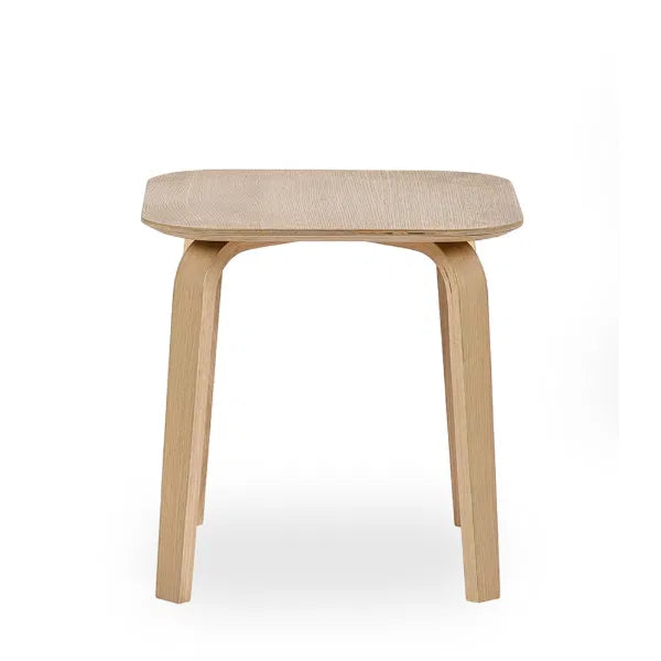 Wooden stool with a beige cushioned seat on a white background