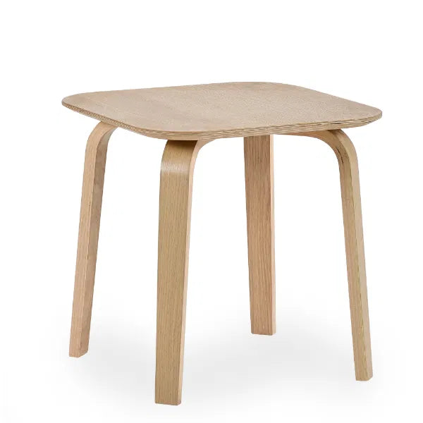 Wooden side table with four legs on a white background
