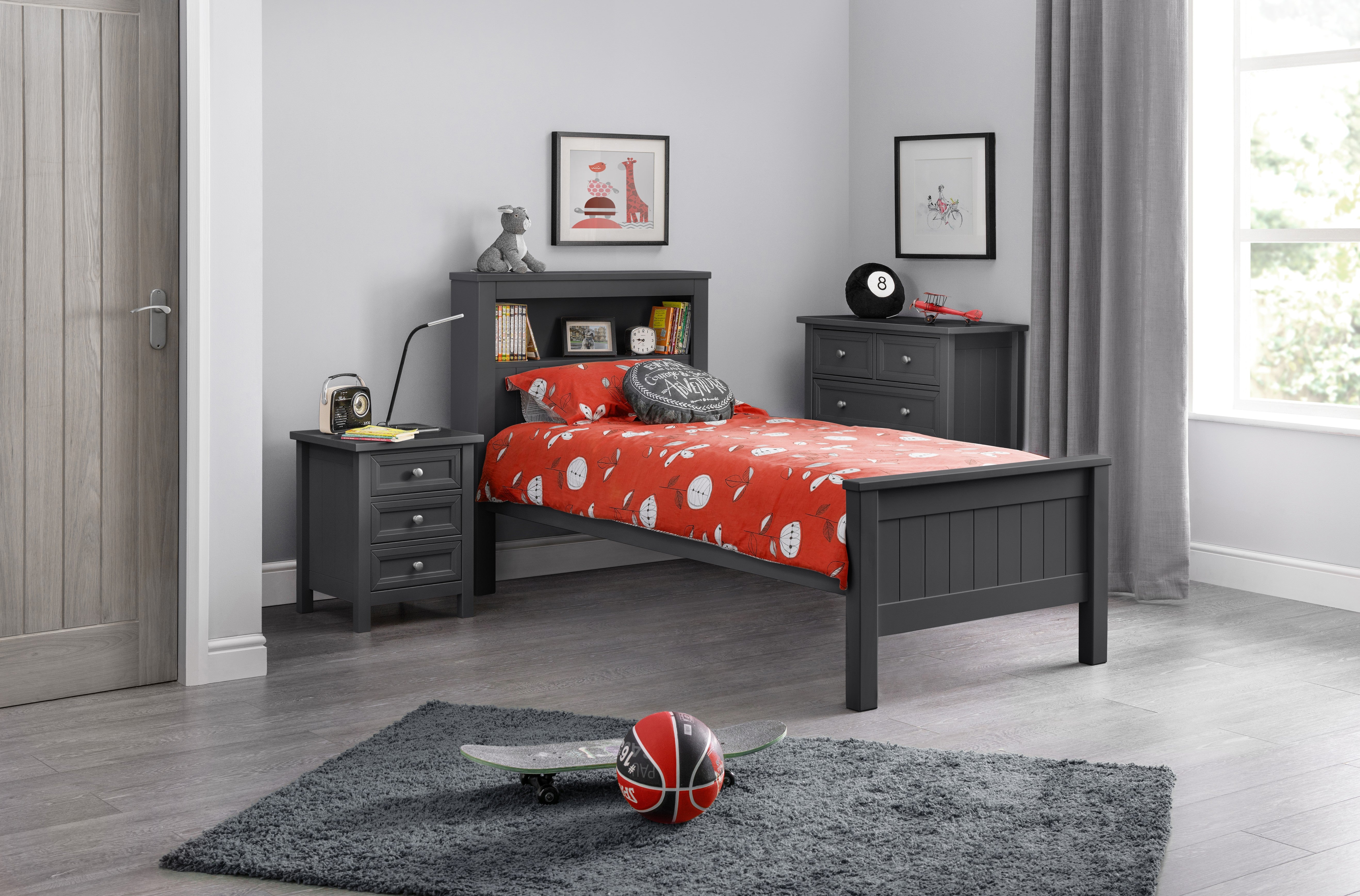 Children's bedroom with gray bed, red bedding, and nightstands.