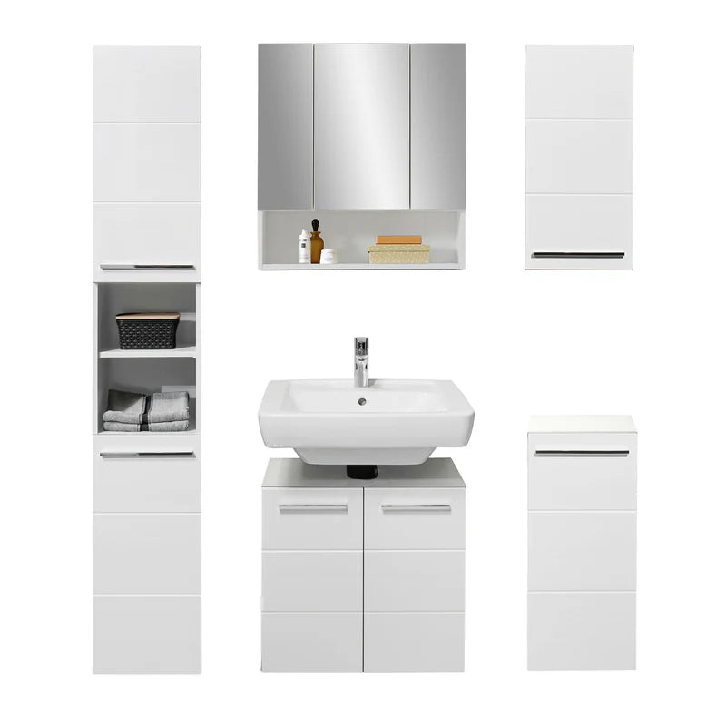 Bathroom vanity set with sink, cabinets, and mirror on a white background