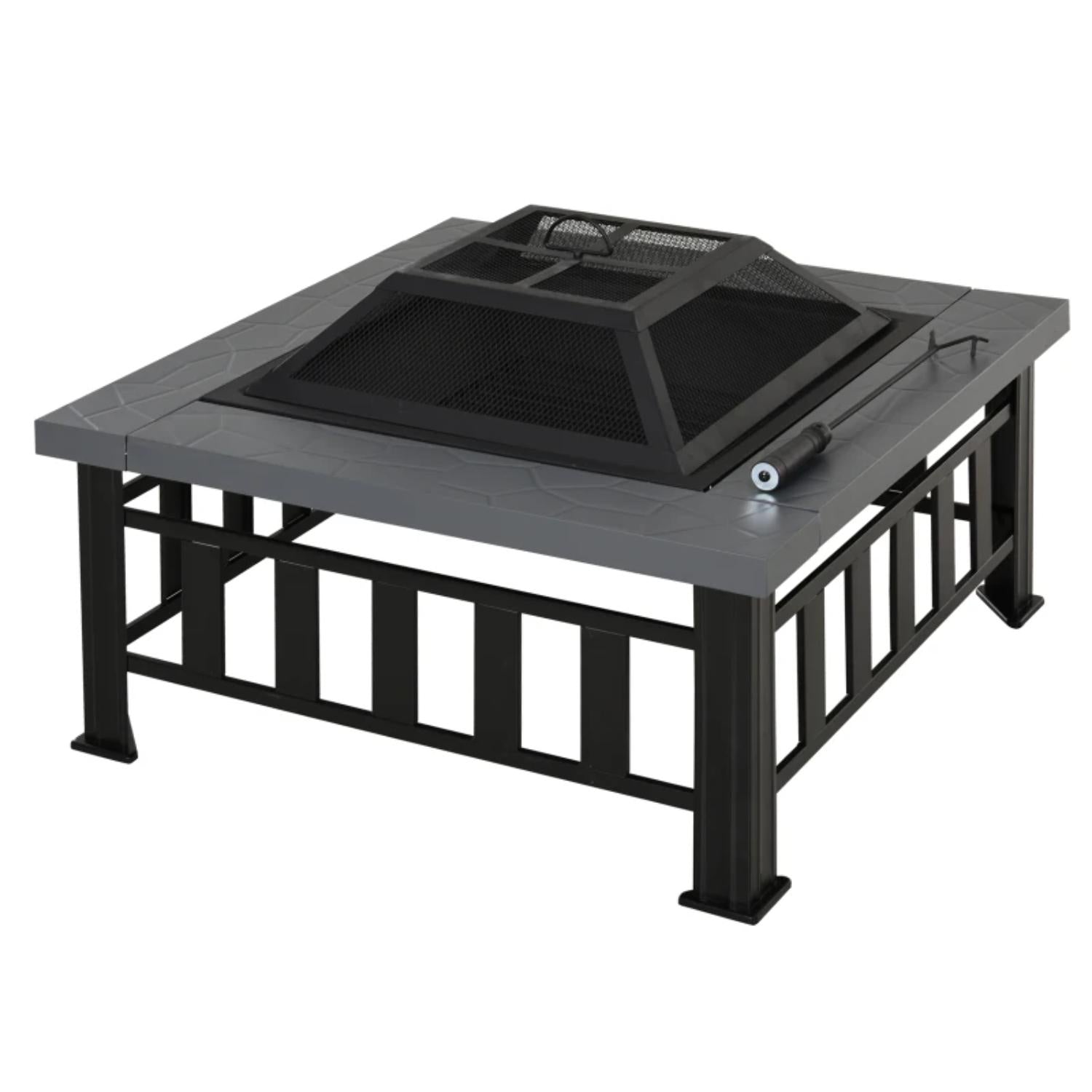 Black metal fire pit table on a white background