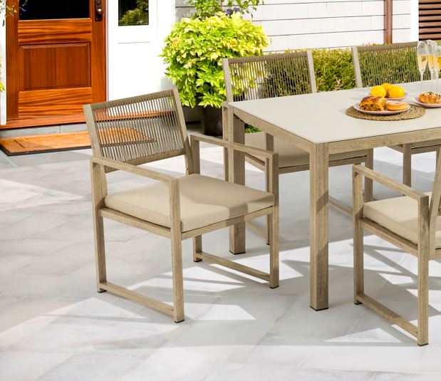 Outdoor dining set with table and chairs on a patio