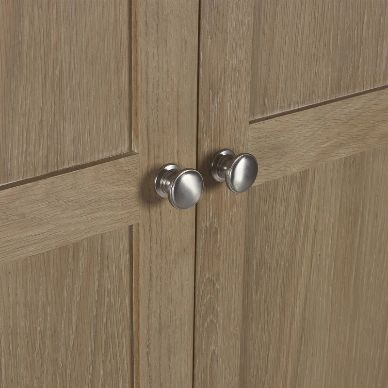 Wooden cabinet with silver knobs