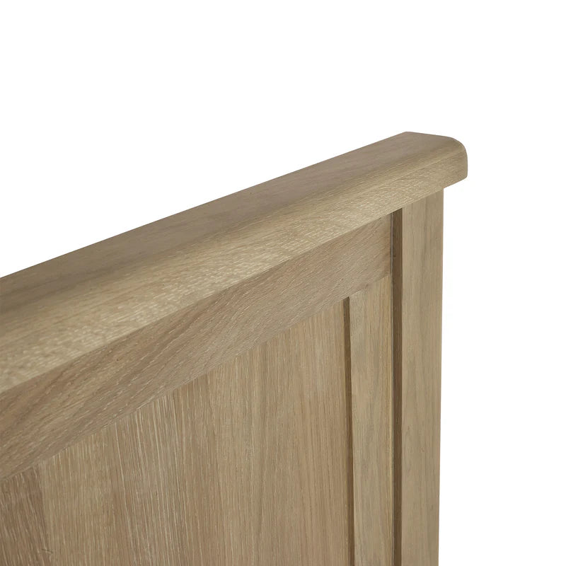 Close-up of a wooden headboard on a white background