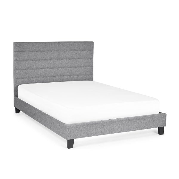 Gray upholstered bed frame with white mattress on a white background