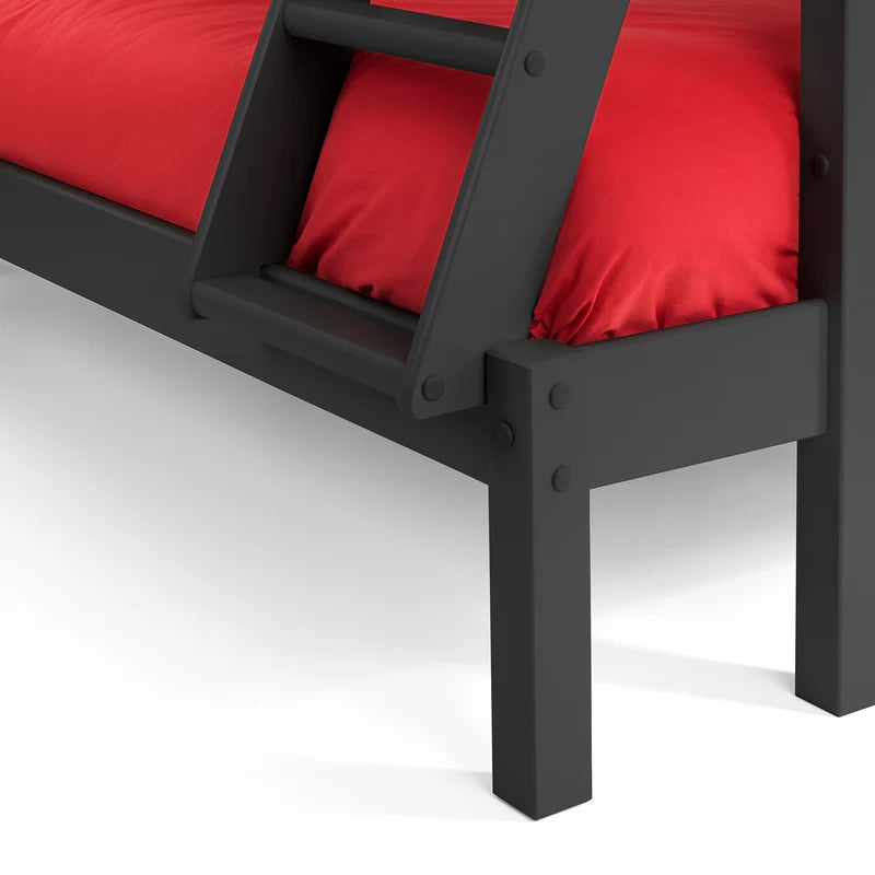 Dark grey bed frame with red mattress on a white background