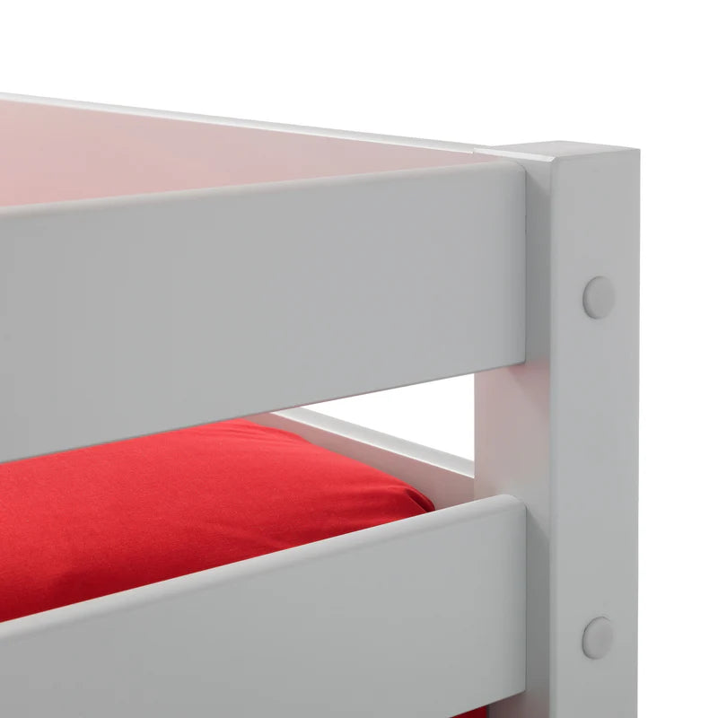 White bunk bed with red mattress on a white background