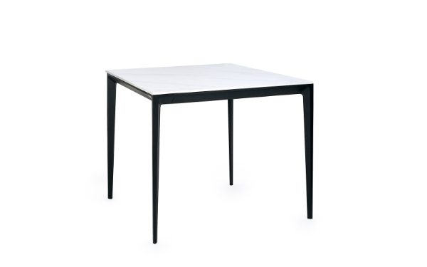 Square table with white top and black legs on a white background