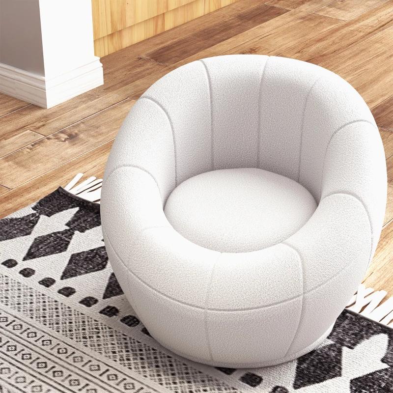 White round chair on a patterned rug with wooden floor