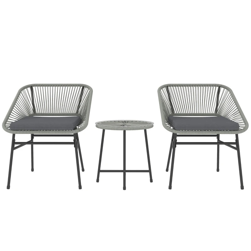 Two gray chairs with cushions and a matching side table on a white background