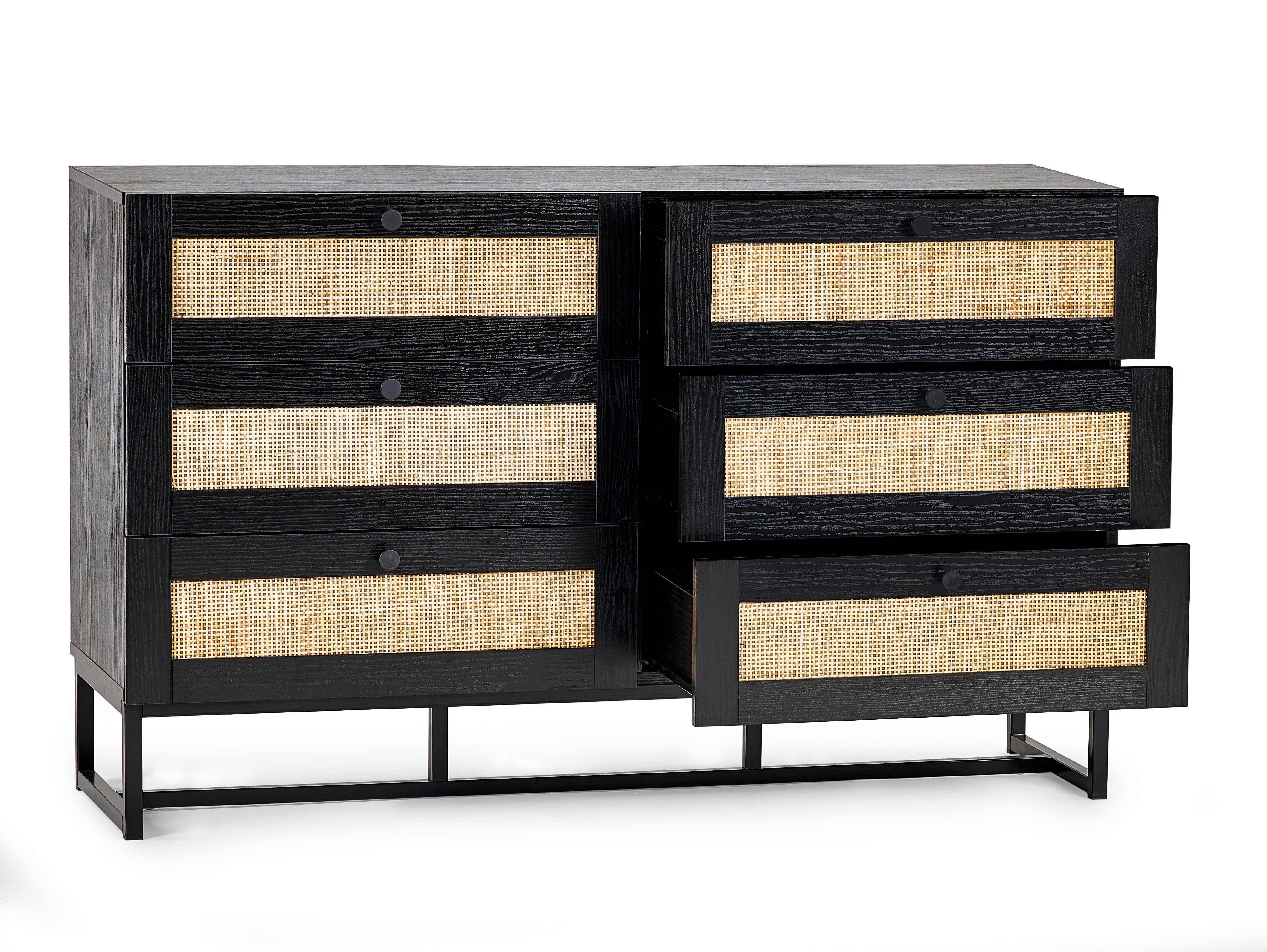 Black dresser with wicker drawers on a white background