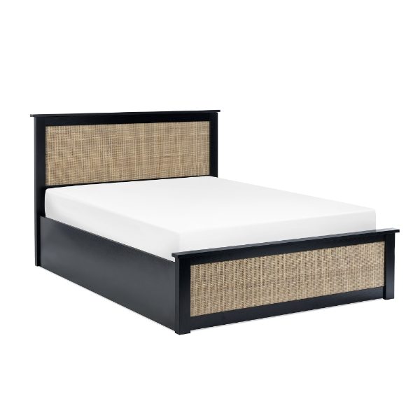 Bed with black frame and woven design on a white background