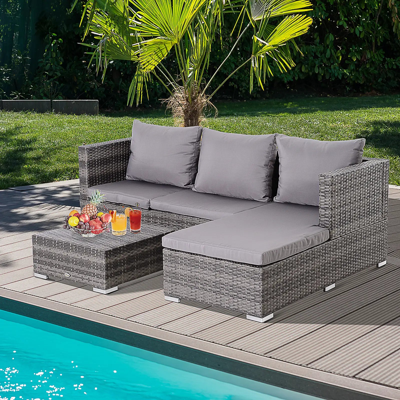 Gray outdoor sectional sofa with cushions by a poolside