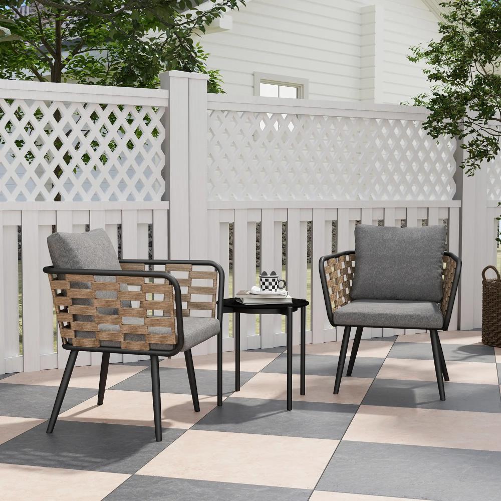 Outdoor patio set with two chairs and a small table on a checkered patio floor.