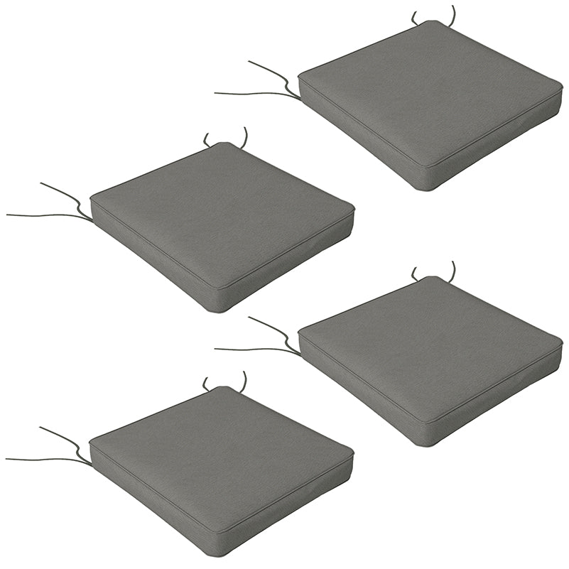 Set of five black square seat cushions on a white background